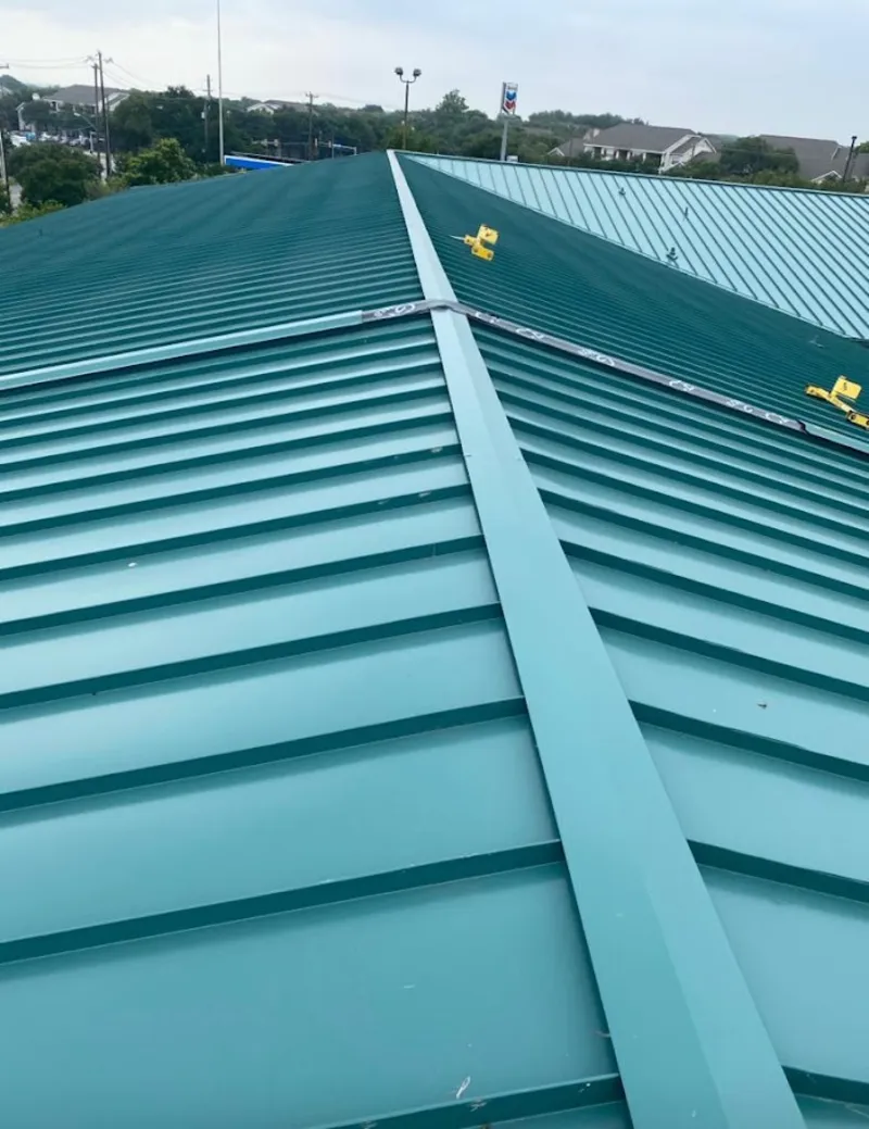 Green commercial metal roof ridge and valley for Metal Roof Repair in Wixom