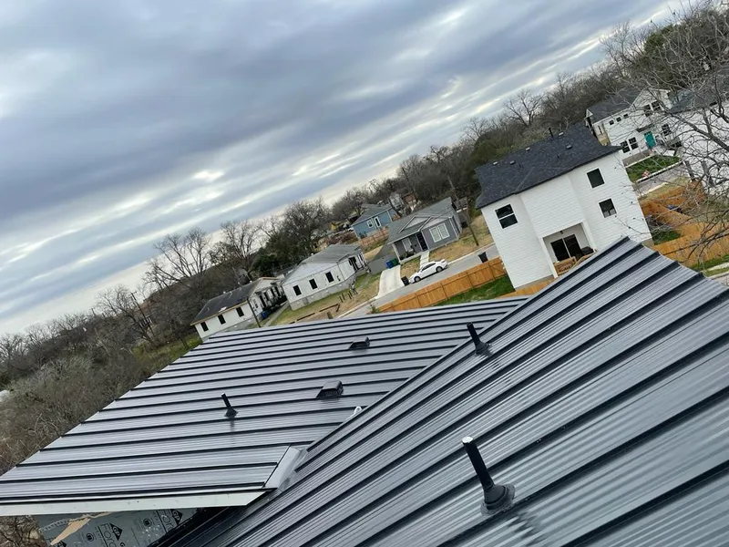 Standing seam metal roof panels with vents for Skylight Repair in Wixom